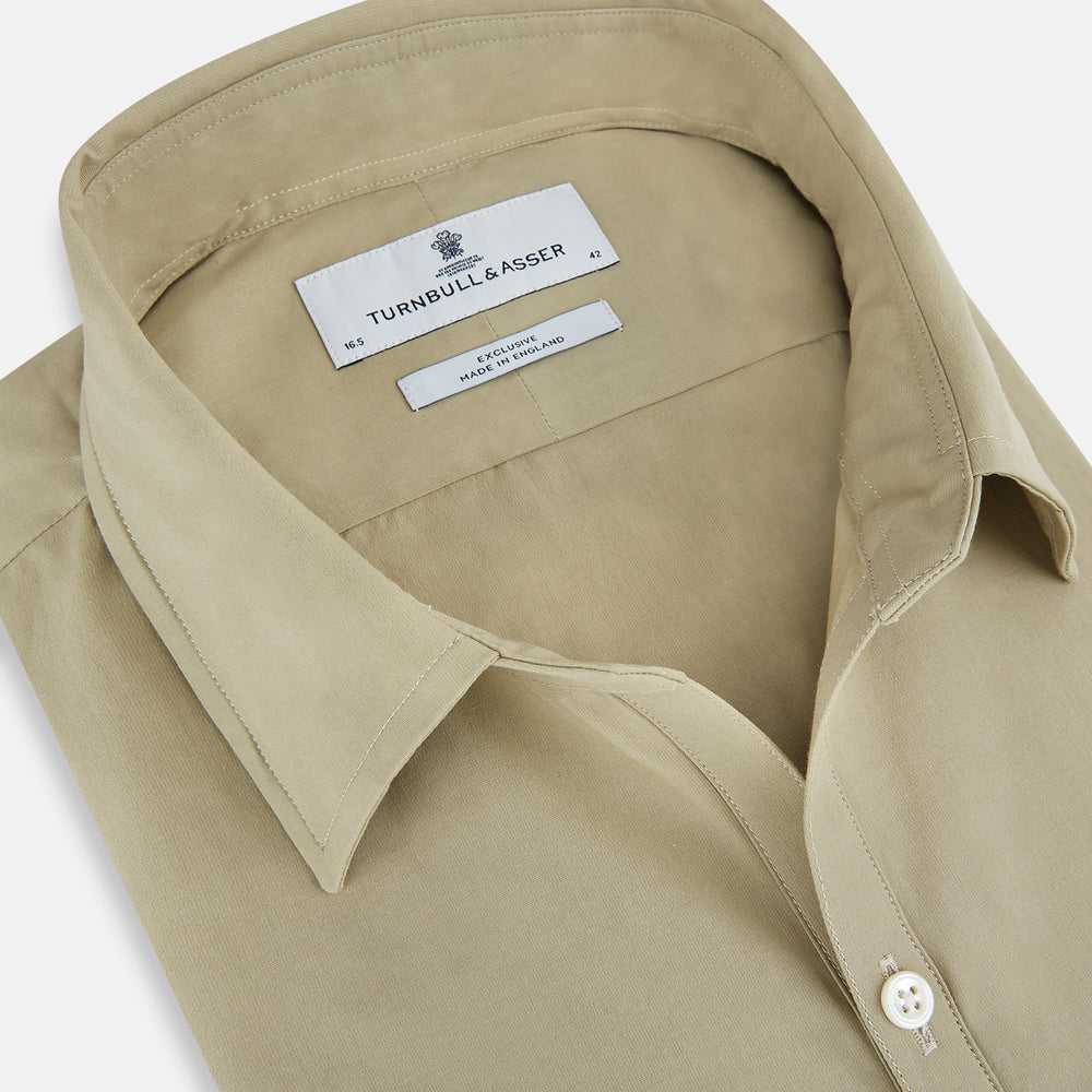 The TAUPE WINDSOR SHIRT by Turnbull & Asser features a Windsor collar and buttoned cuffs. This long-sleeve shirt showcases refined British design and is displayed flat on a white background.