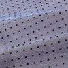 View 4 of product A light gray pocket square with small black polka dots pairs perfectly with the Turnbull & Asser Navy and Light Blue Micro Dot Silk Cravat for a refined, polished formal look.
