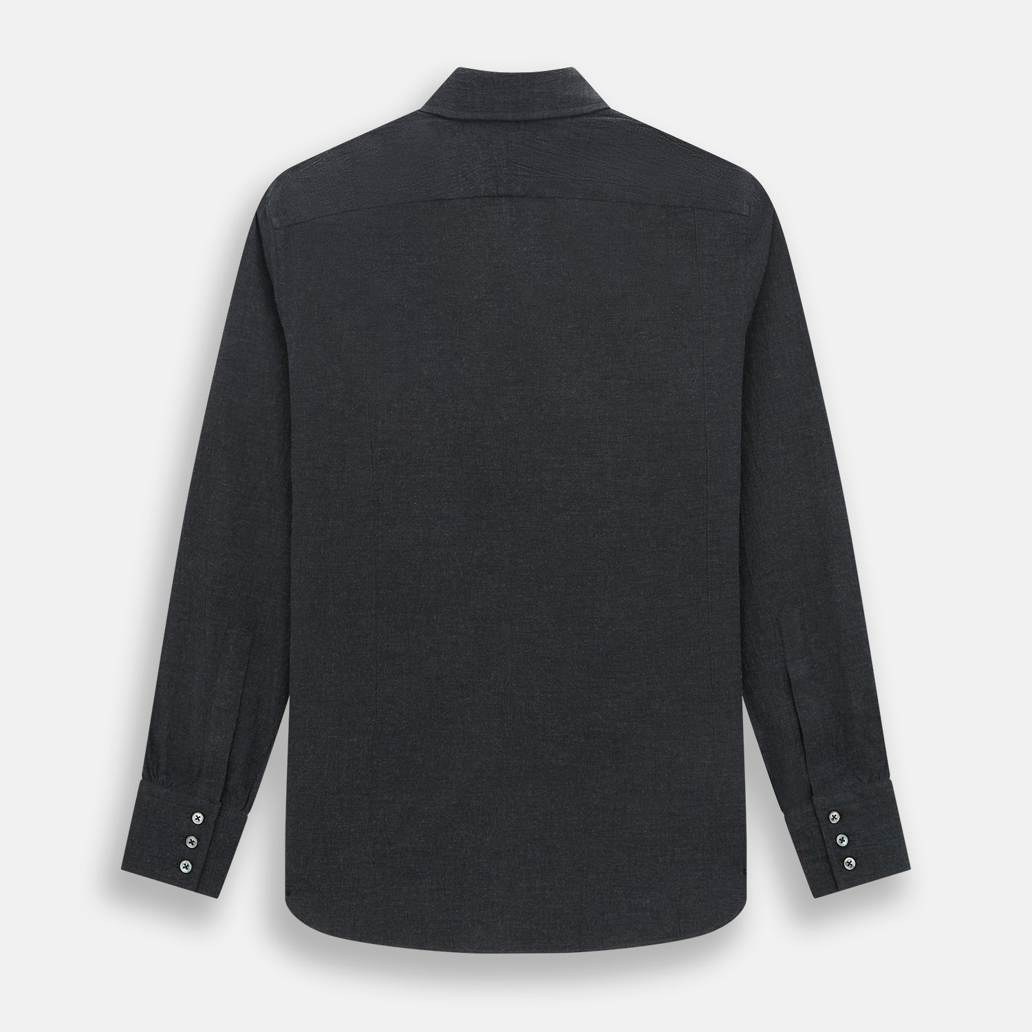 View 3 of product The Turnbull & Asser Midnight Blue Westminster Shirt features long sleeves, a button-up front, classic collar, and buttoned cuffs in a plain design—showcasing British craftsmanship—laid flat on a white background.