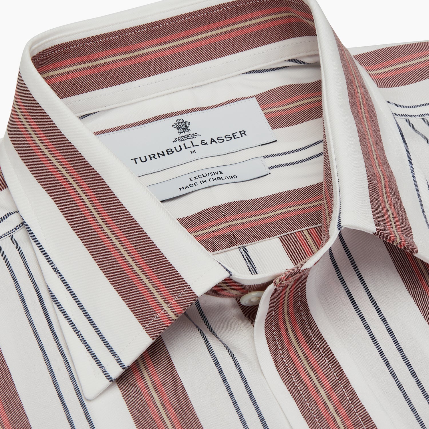 View 4 of product The Turnbull & Asser Red, Blue & White Stripe Weekend Fit Shirt features a Derby collar, 1-button cuffs, and crisp stripes—ideal for stylish winter layering.