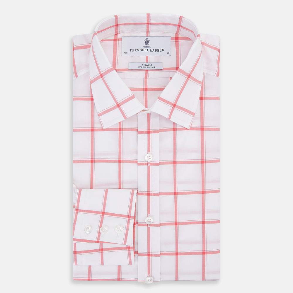 The Turnbull & Asser Coral Grid Check Mayfair Shirt is a white long-sleeve shirt with a collar, made from fine Italian cotton and featuring an evenly spaced coral grid check pattern.