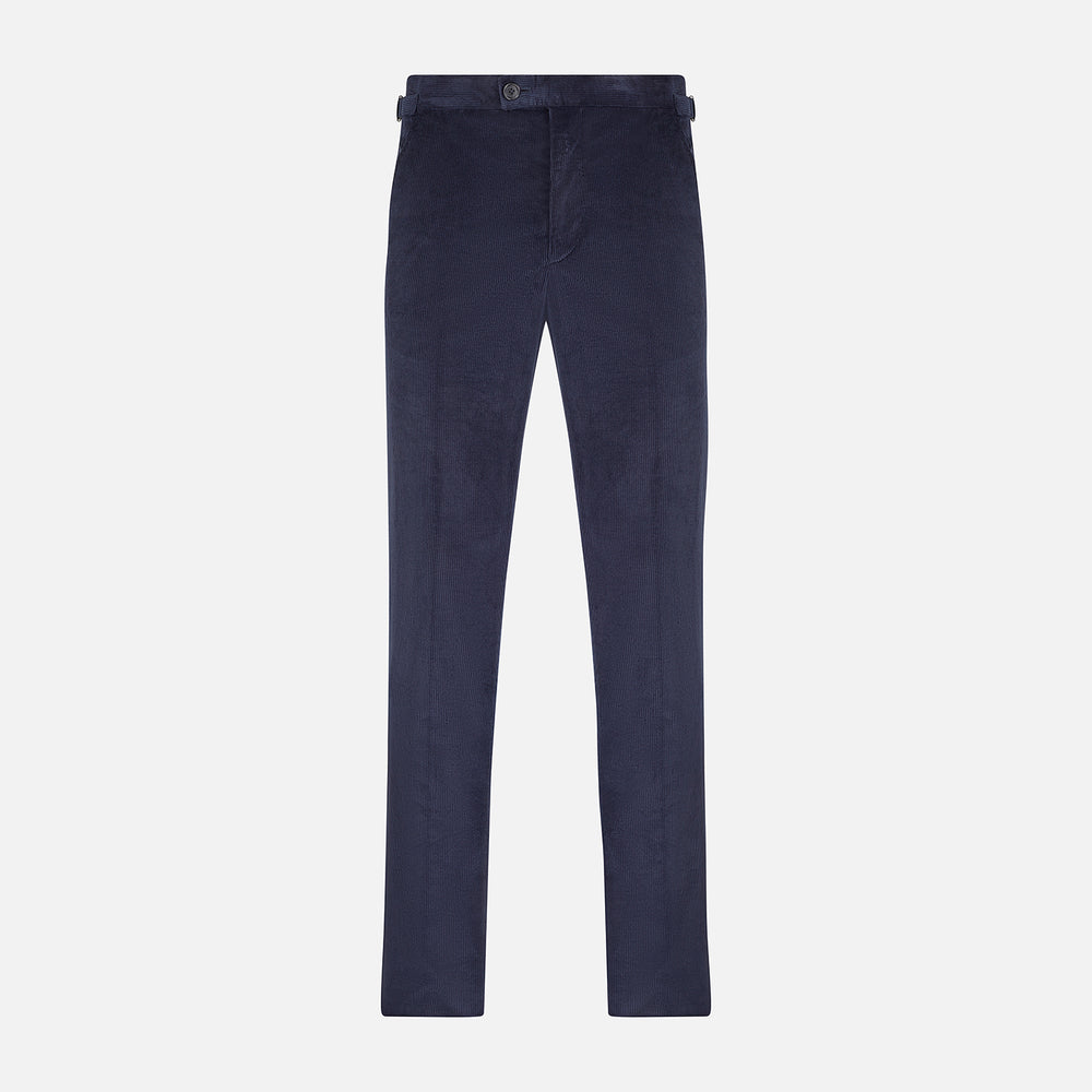 The Turnbull & Asser Navy Corduroy Henry Trousers are tailored fit with a straight-leg cut, made from a wool-cotton blend, and feature front button and zip closure, shown against a plain white background.