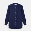 View 1 of product The Turnbull & Asser Blue Soft-touch Silk Lauren Shirt is a navy, long-sleeve button-up with an Igret stand collar, white buttons, curved hem, relaxed fit, and elongated body for a modern look, shown laid flat on a white background.