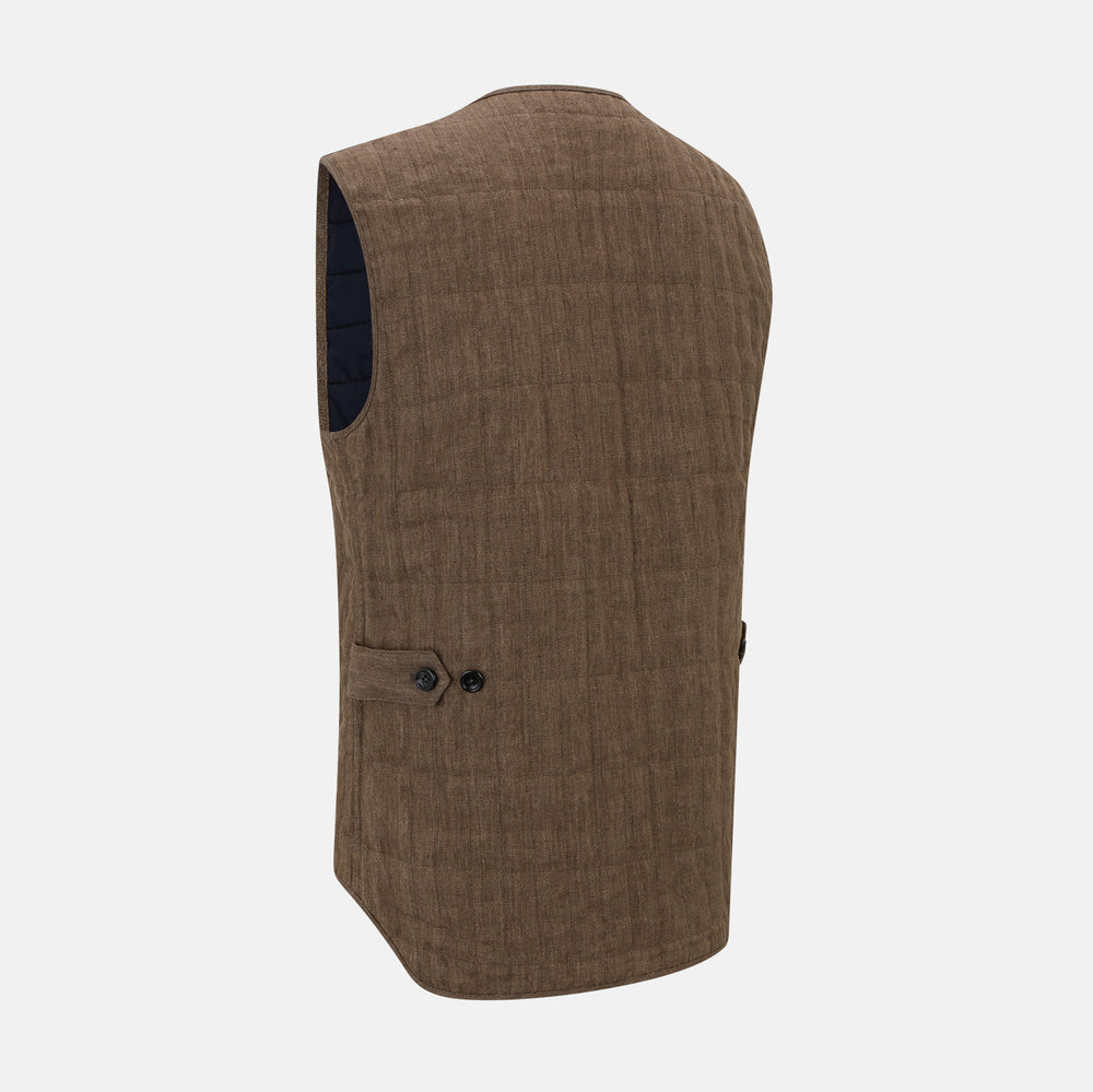 The Turnbull & Asser Pine Cone Quilted Linen Herringbone Waistcoat features a brown, sleeveless design with dark buttons, two angled side pockets, and a chest pocket, shown on a plain white background.