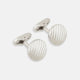 Turnbull & Asser’s Silver Striped Circle Cufflinks feature classic diagonal grooves and are shown against a white background.