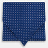 View 1 of product The Turnbull & Asser Pink Dot and Royal Blue Silk Cravat is an elegant British-style wedding accessory, neatly folded with a pointed edge and finished with pink dots, perfect for complementing formal attire.