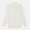 View 5 of product The Cream Silk Long Point Embroidered Eamon Shirt by Turnbull & Asser features long sleeves, a pointed collar, and delicate botanical embroidery. Its buttoned cuffs and tailored fit make it an elegant partywear choice.