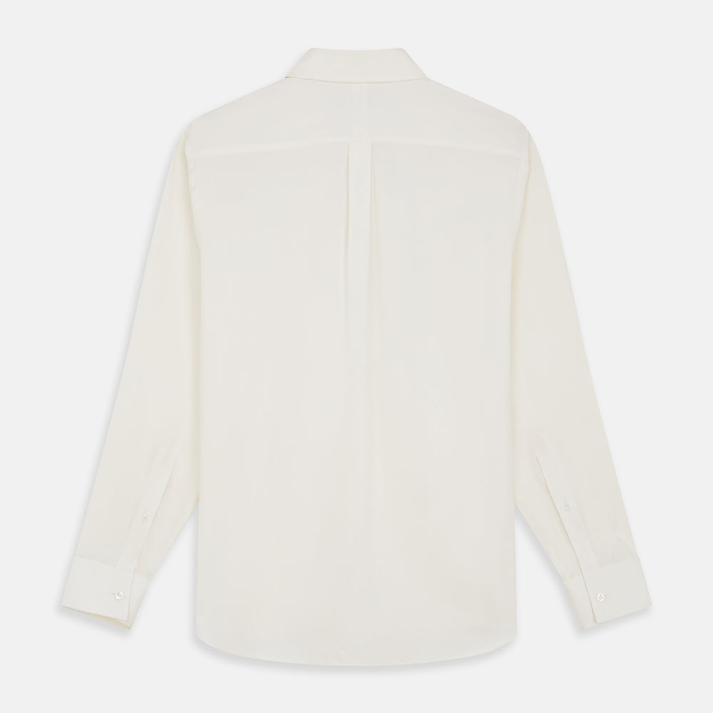 The Cream Silk Long Point Embroidered Eamon Shirt by Turnbull & Asser features long sleeves, a pointed collar, and delicate botanical embroidery. Its buttoned cuffs and tailored fit make it an elegant partywear choice.
