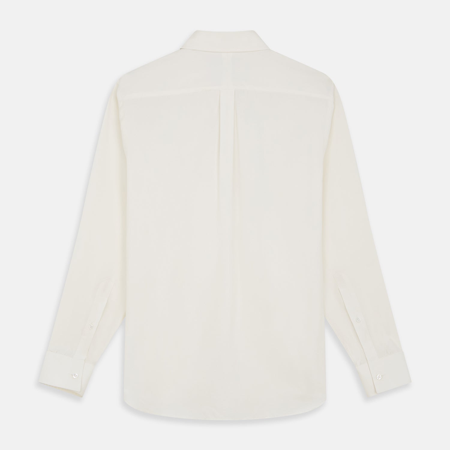 View 5 of product The Cream Silk Long Point Embroidered Eamon Shirt by Turnbull & Asser features long sleeves, a pointed collar, and delicate botanical embroidery. Its buttoned cuffs and tailored fit make it an elegant partywear choice.