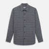 View 1 of product The Turnbull & Asser Charcoal Melange Check Hampstead overshirt, a long-sleeve button-up with a collar and two zippered side pockets, is laid flat on a light gray background.