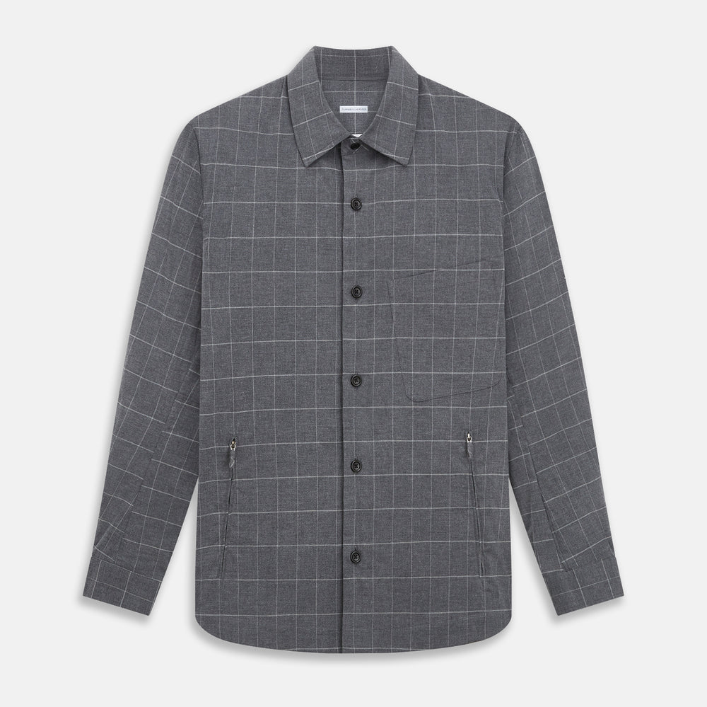 The Turnbull & Asser Charcoal Melange Check Hampstead overshirt, a long-sleeve button-up with a collar and two zippered side pockets, is laid flat on a light gray background.