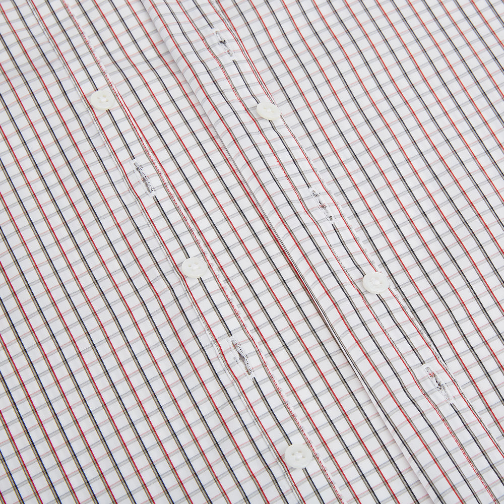 The Turnbull & Asser Red and Midnight Blue Tattersall Check Windsor Shirt features British craftsmanship, shown laid flat with sleeves extended and collar neatly folded.