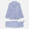 View 2 of product The Turnbull & Asser Women's Harriet Blue Bengal Stripe Pyjama Set features premium cotton, a long-sleeve button-up top with chest pocket, and drawstring pants—an ideal gift option.