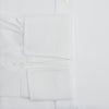 View 4 of product The Turnbull & Asser White Marcella Dress Shirt features a T&A collar, double cuffs, and pleated front detailing—ideal for formal occasions. Displayed on a plain white background.