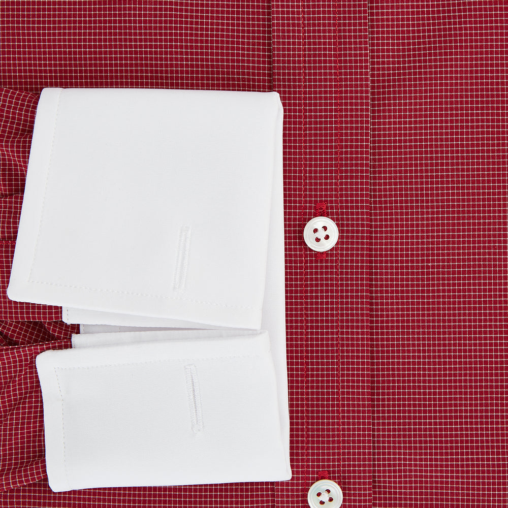 The Turnbull & Asser Dark Red Pin Check Shirt features a crisp white contrast collar and cuffs, with long sleeves and button-up design, shown against a white background.