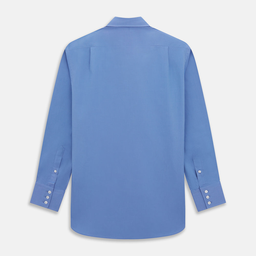 The Turnbull & Asser "The World Is Not Enough" blue cotton Istanbul shirt, as seen on James Bond, is a light blue oxford long-sleeve button-up with a pointed collar and white buttons, displayed on a white background.