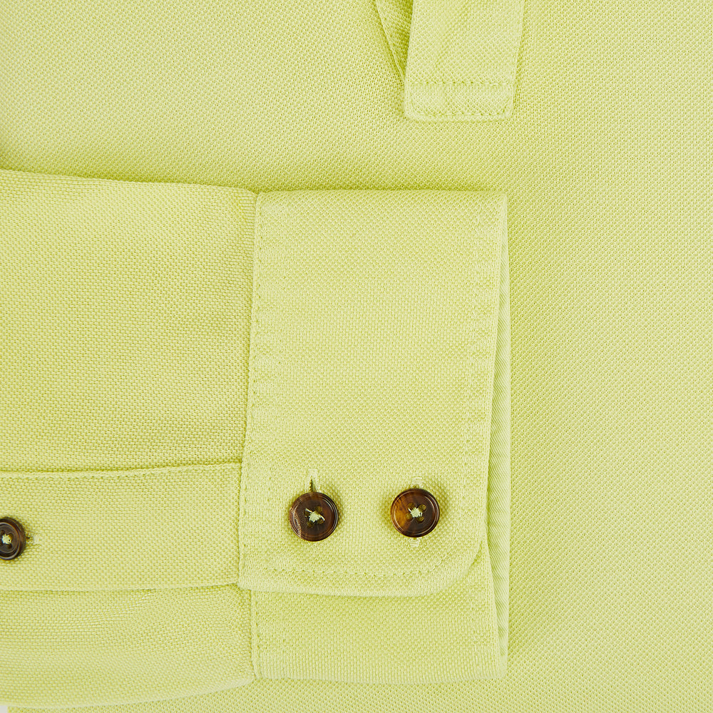 The Turnbull & Asser Lime Green Rugby Polo Shirt is a pure cotton, long-sleeve shirt with a collar and no visible buttons, displayed flat against a white background.