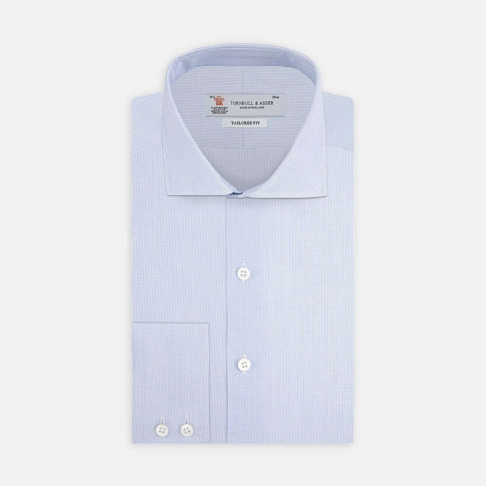 A Tailored Fit Blue Fine Bengal Stripe Shirt with a Kent Collar and 2-button cuffs by Turnbull & Asser, neatly folded and displayed against a plain white background.