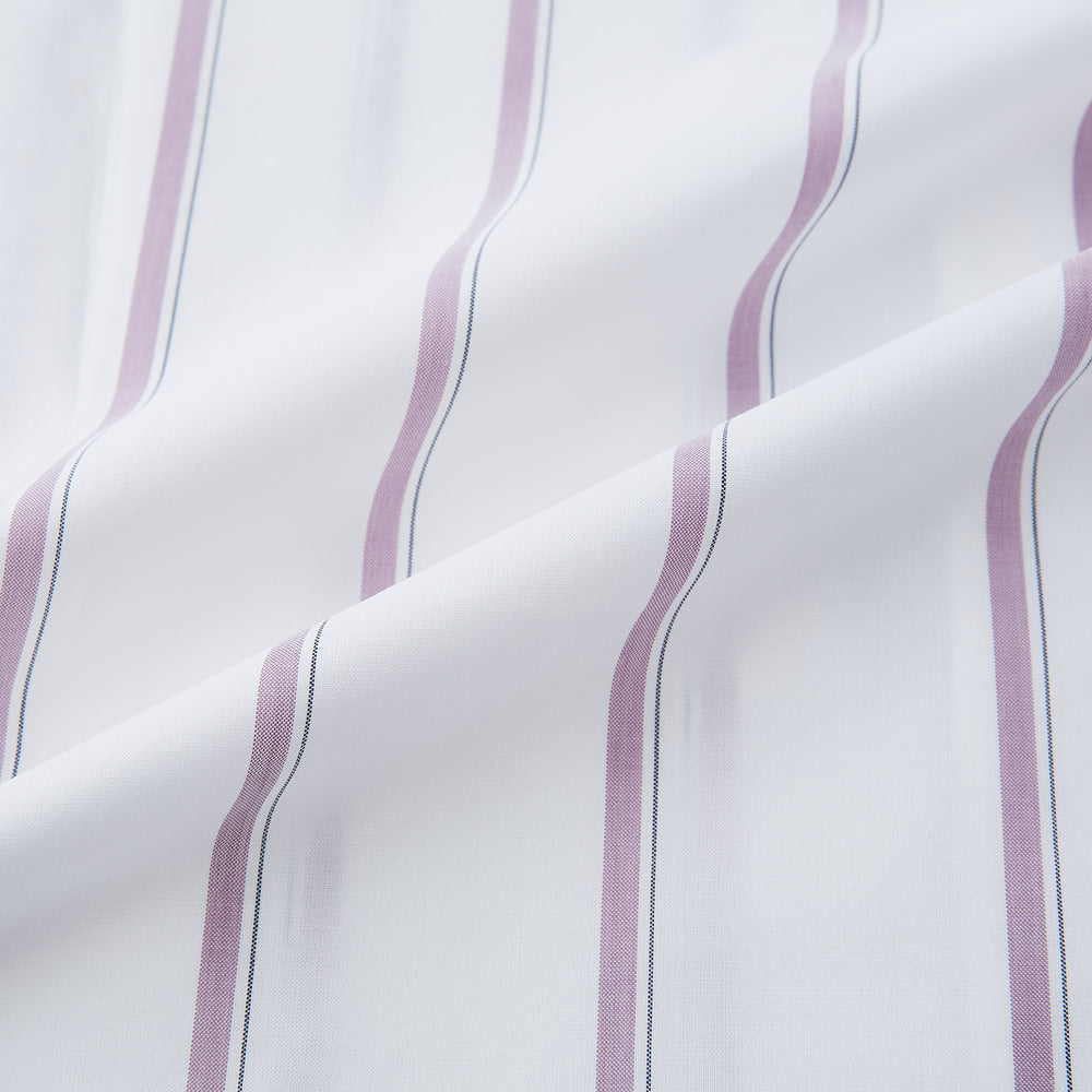 The Turnbull & Asser Antique Pink Track Stripe Mayfair Shirt is a white, long-sleeved Italian cotton shirt with vertical pink stripes, a spread collar, and buttoned cuffs, shown laid flat on a white background.
