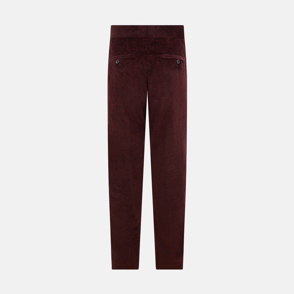 The Turnbull & Asser Burgundy Corduroy Henry Trousers feature a straight-leg cut, button and zip closure, and adjustable side tabs—perfect for refined formalwear—shown here on a plain white background.