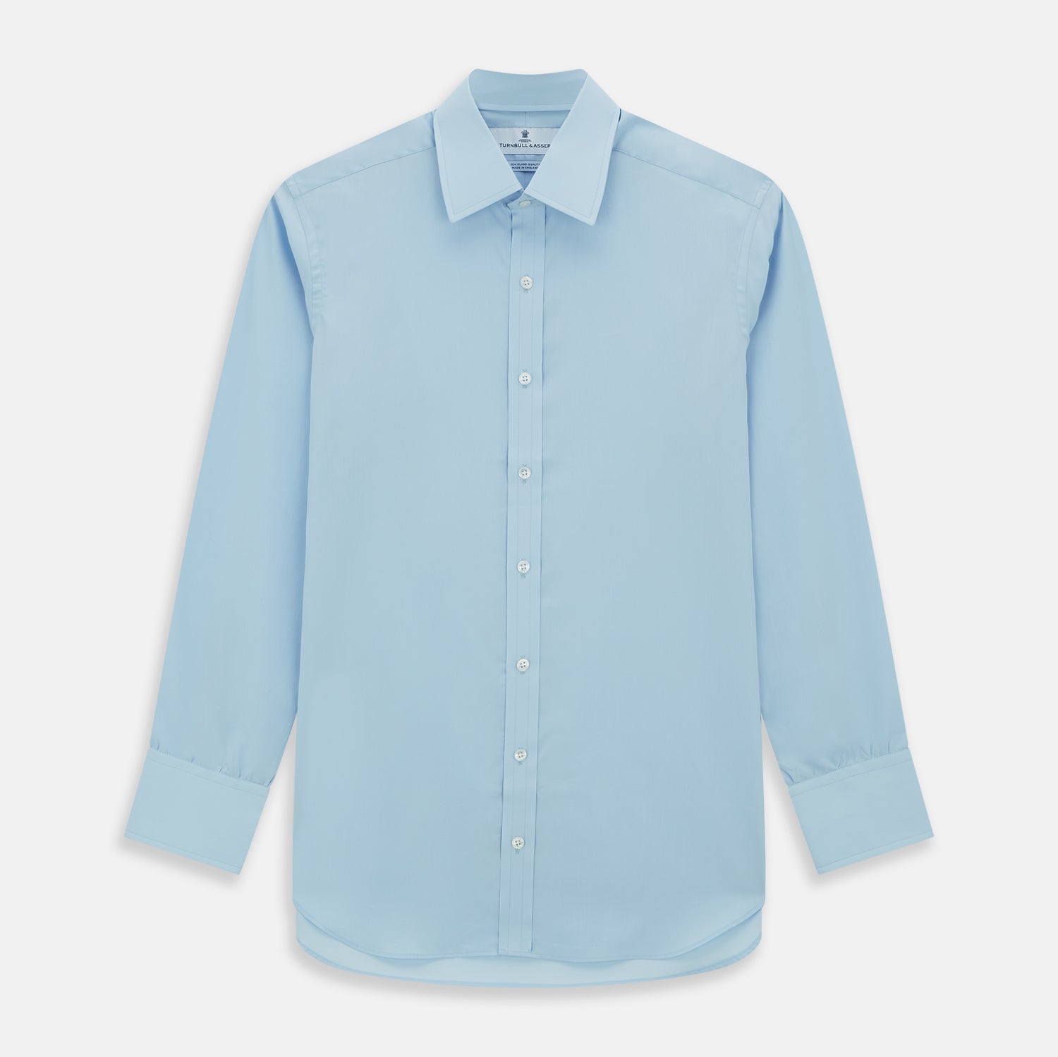 View 1 of product The Turnbull & Asser Light Blue Sea Island Quality Cotton Shirt features a T&A collar, 3-button cuffs, and premium cotton fabric, shown laid flat against a white background.