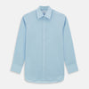 View 1 of product The Turnbull & Asser Light Blue Sea Island Quality Cotton Shirt features a T&A collar, long sleeves, and 3-button cuffs, beautifully displayed flat on a white background.
