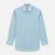 The Turnbull & Asser Light Blue Sea Island Quality Cotton Shirt features a T&A collar, long sleeves, and 3-button cuffs, beautifully displayed flat on a white background.