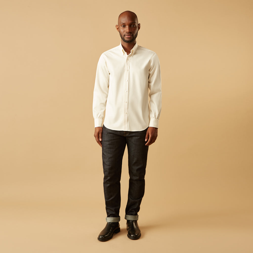 The Turnbull & Asser Cream Weekend Fit Hayne Shirt features a Dorset collar and 1-button cuffs, displayed long-sleeved and laid flat on a white background.