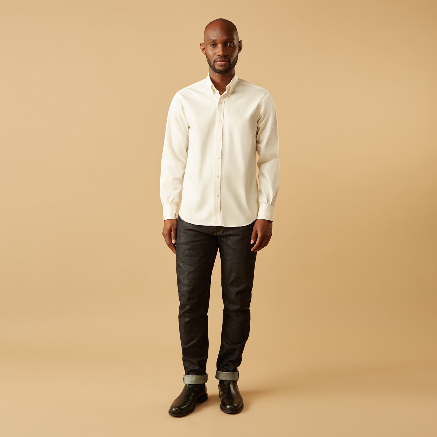View 2 of product The Turnbull & Asser Cream Weekend Fit Hayne Shirt features a Dorset collar and 1-button cuffs, displayed long-sleeved and laid flat on a white background.