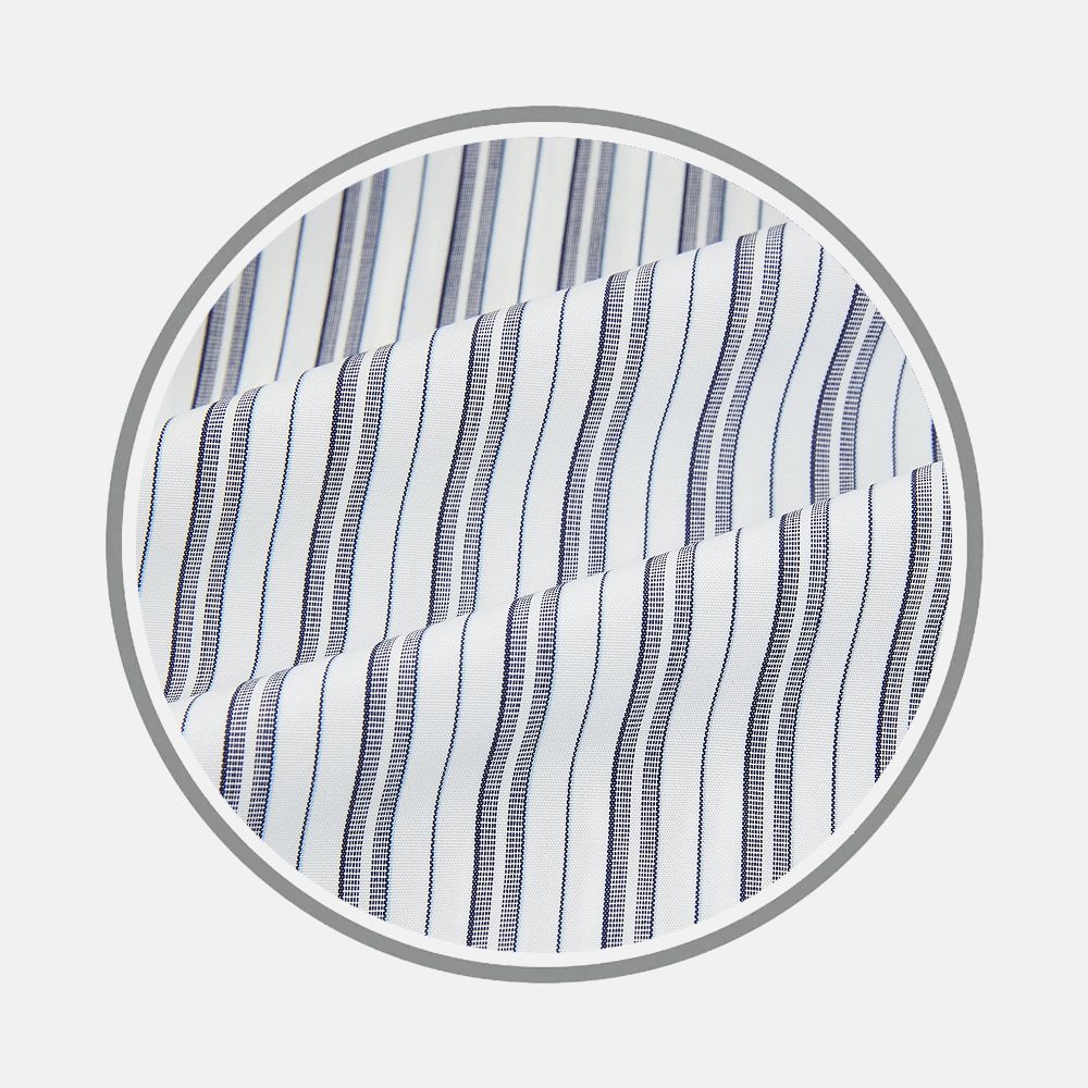 Close-up of Turnbull & Asser’s Navy Multi Stripe Fabric, featuring evenly spaced vertical navy blue and light blue stripes, presented in a circular frame against a plain light background.
