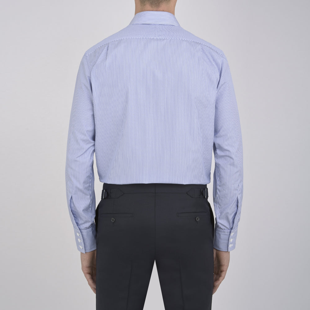 The Turnbull & Asser Blue Fine Bengal Stripe Shirt features a classic T&A collar, 3-button cuffs, and white buttons, crafted from fine cotton and displayed against a crisp white background.