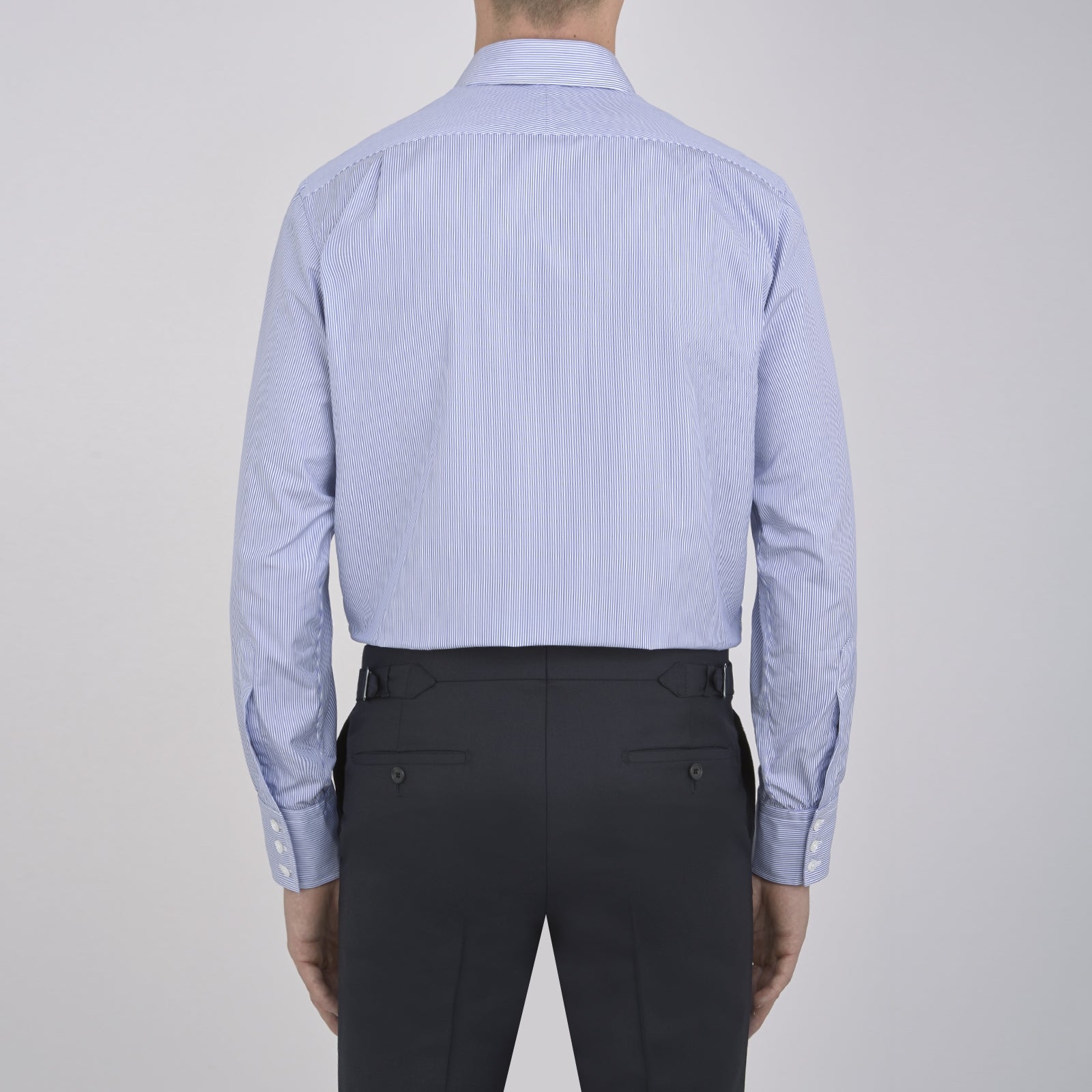 View 6 of product The Turnbull & Asser Blue Fine Bengal Stripe Shirt features a classic T&A collar, 3-button cuffs, and white buttons, crafted from fine cotton and displayed against a crisp white background.