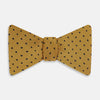 View 1 of product The Navy and Yellow Micro Dot Silk Bow Tie by Turnbull & Asser features a refined dot pattern—an ideal accessory for elevating sophisticated outfits.