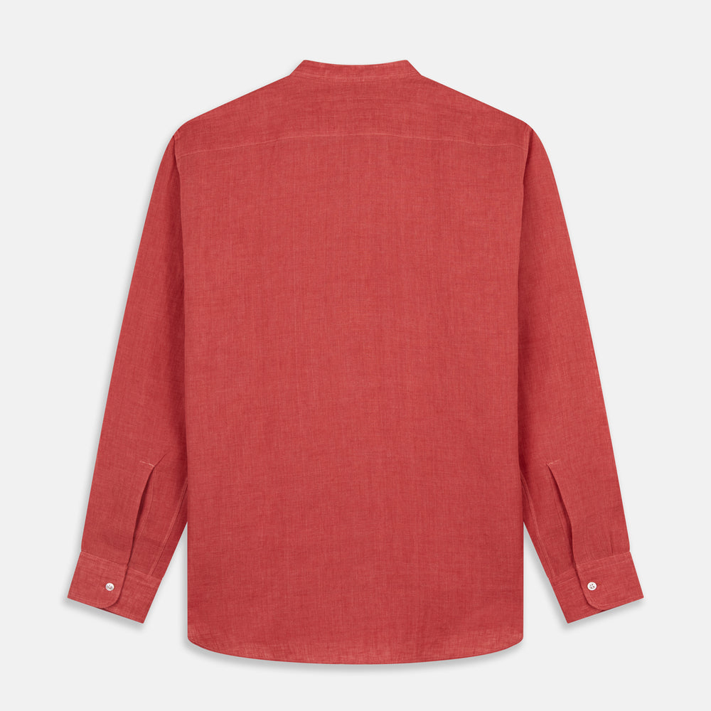 The Turnbull & Asser Plain Red Linen Weekend Fit Shirt with Stand Collar features long sleeves, a button-up front, and two buttoned-flap chest pockets. It is shown neatly laid flat on a plain light background.