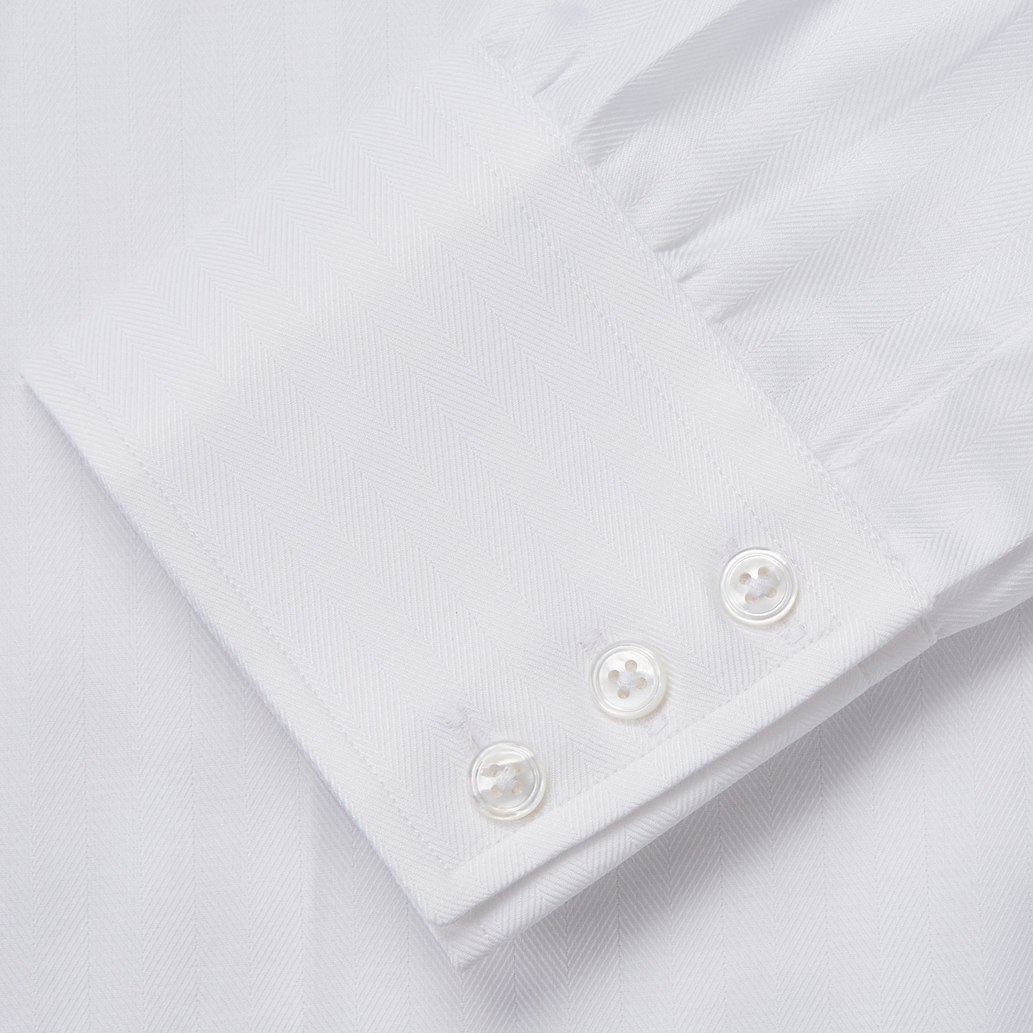 View 5 of product The Turnbull & Asser White Herringbone Tailored Fit Shirt with a Kent collar is displayed on a white background.
