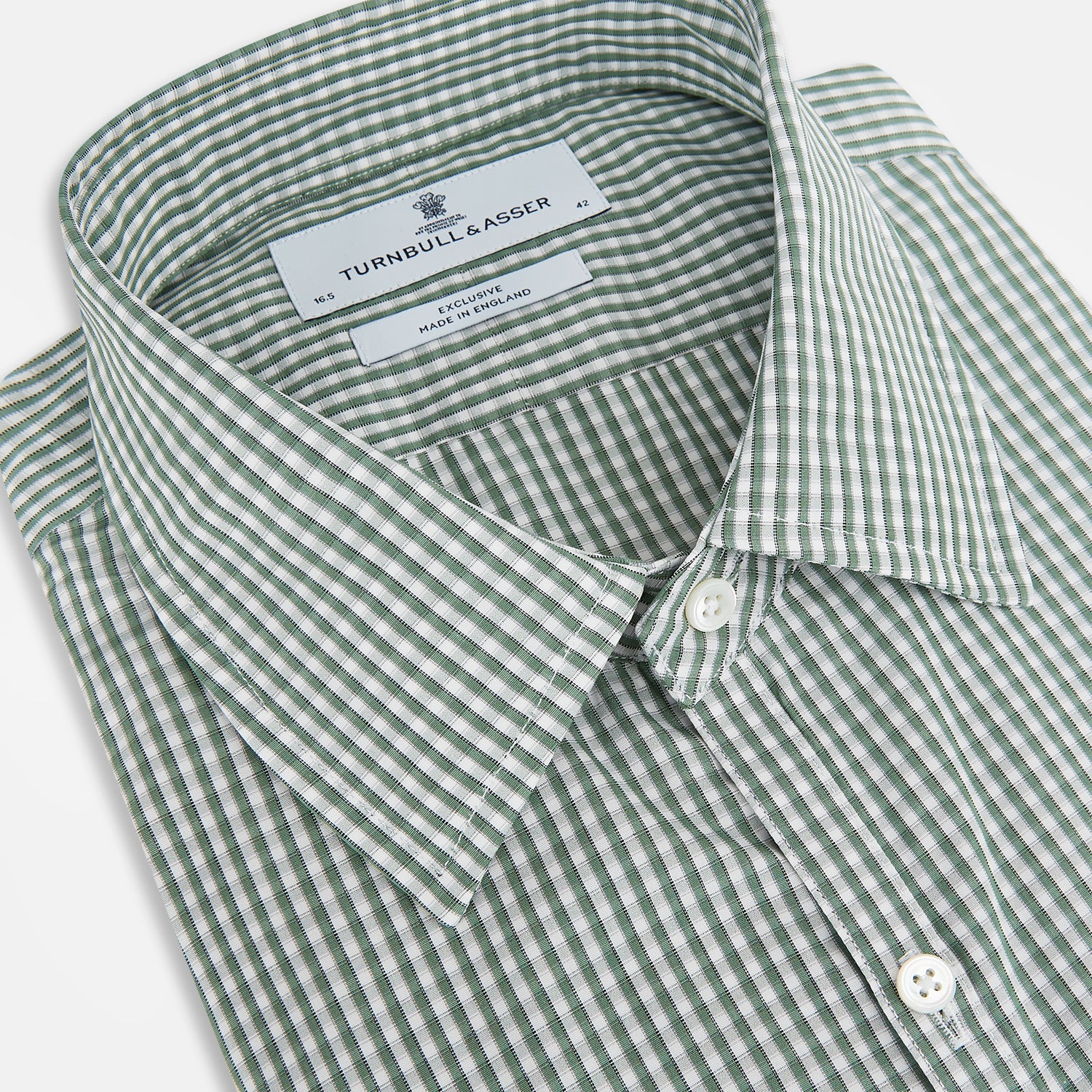 View 2 of product The MELON GREEN MICRO SHADOW CHECK WESTMINSTER SHIRT by Turnbull & Asser is a long-sleeved, button-up shirt with a green and white checkered pattern, pointed collar, and buttoned cuffs, shown on a white background.