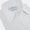 View 2 of product The Turnbull & Asser White Royal Oxford Cotton Windsor Shirt features a Turnbull open collar, long sleeves, 3-button cuffs, and a straight hem, shown against a plain white background.