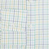 View 4 of product The Turnbull & Asser Multi Tone Double Grid Check Mayfair Shirt is a long-sleeve, button-up with a classic collar, showcasing pure cotton light blue, green, and yellow grid checks on white, neatly displayed flat against a white surface.