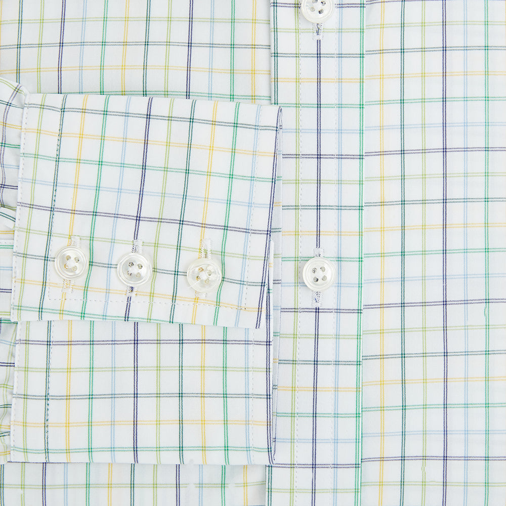 The Turnbull & Asser Multi Tone Double Grid Check Mayfair Shirt is a long-sleeve, button-up with a classic collar, showcasing pure cotton light blue, green, and yellow grid checks on white, neatly displayed flat against a white surface.