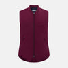 View 1 of product The Turnbull & Asser Wine Red Padded Gilet features a sleeveless design, front zipper, two zippered side pockets, a slanted chest pocket, and a rounded hem—perfect for the modern gentleman and shown on a plain white background.