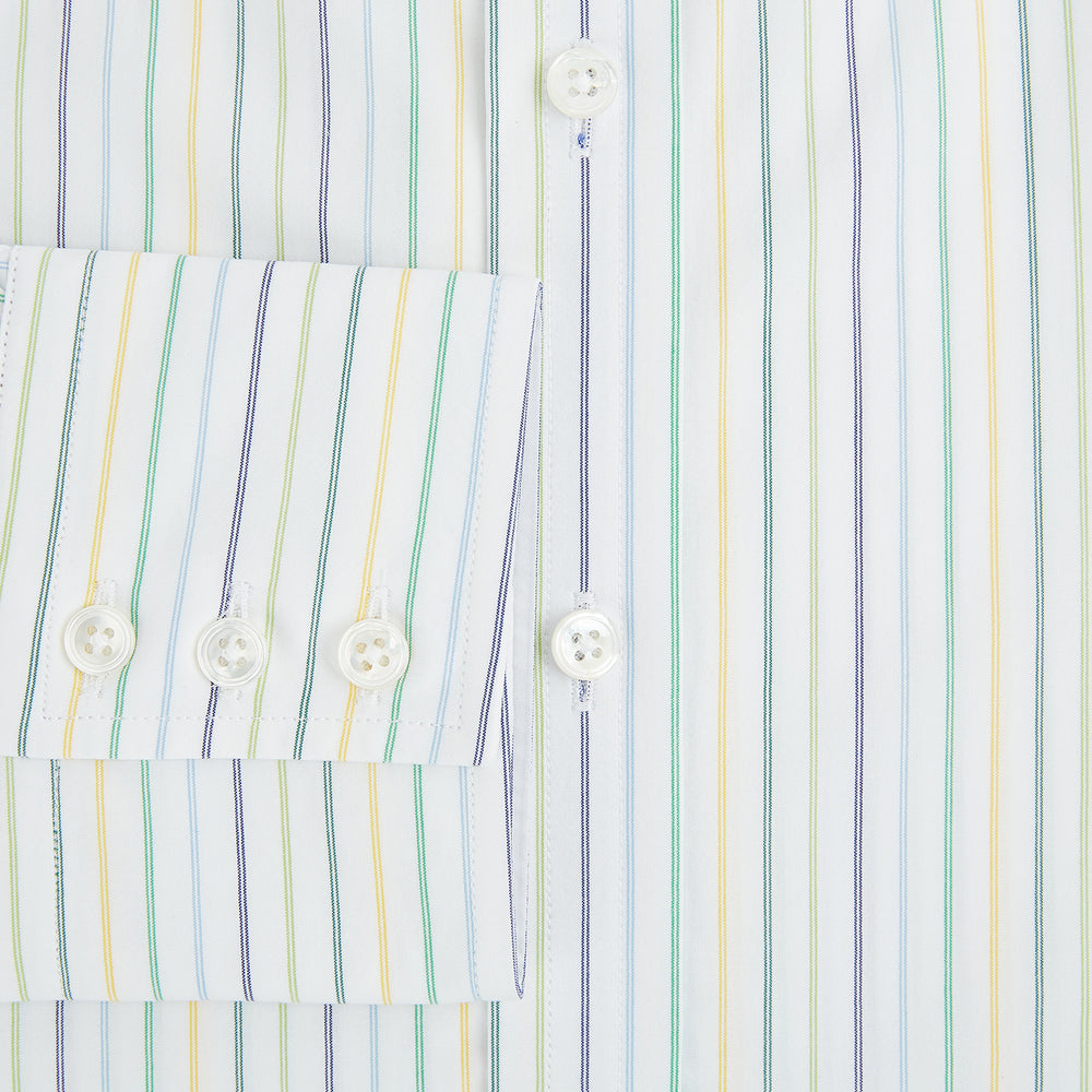 The Turnbull & Asser Multi Tone Double Pinstripe Mayfair Shirt is a long-sleeve pure cotton shirt with a collar and thin blue, green, and yellow double pinstripes on a white background.