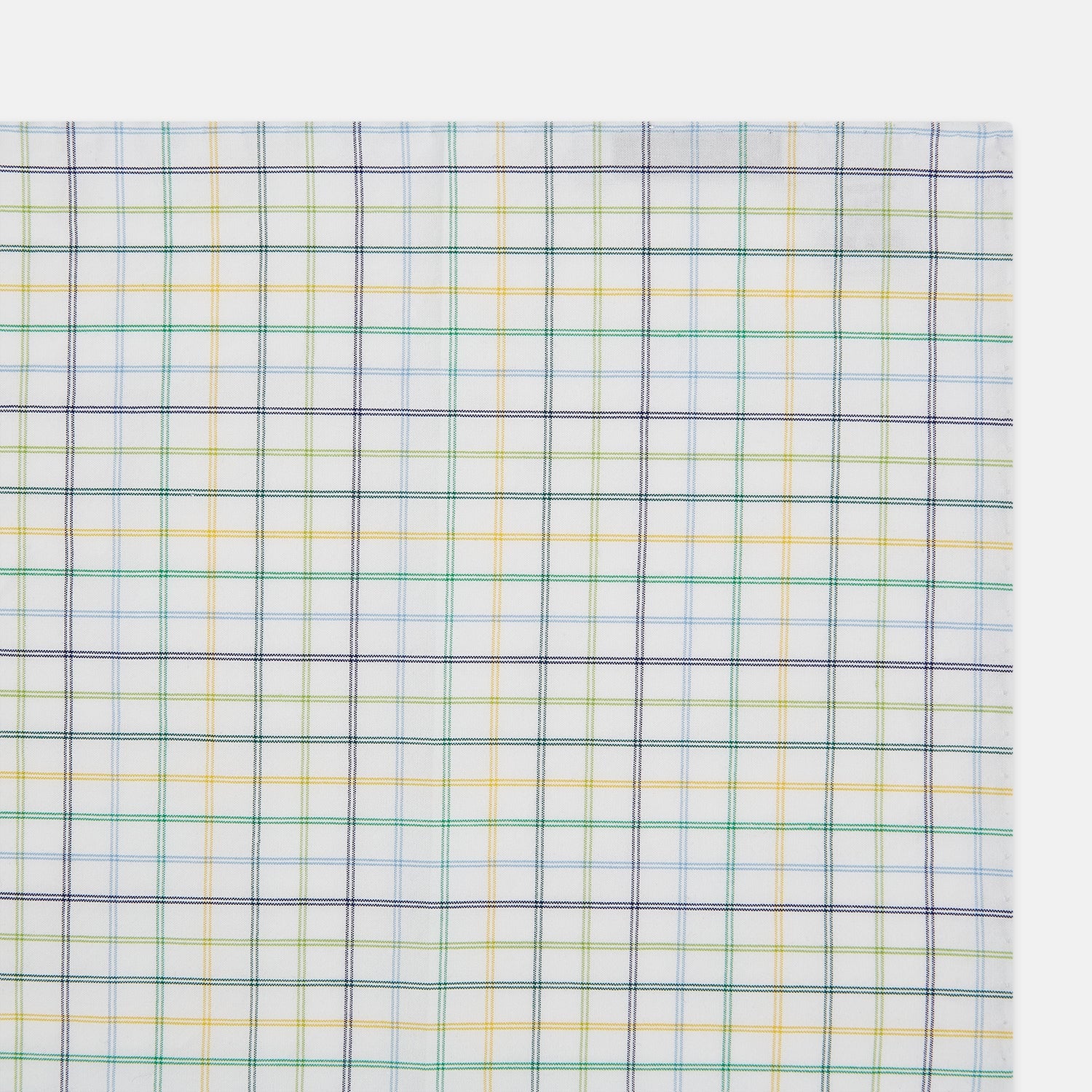 View 2 of product The Yellow Multi Double Grid Check Hand-Rolled Handkerchief by Turnbull & Asser is handcrafted in England, featuring a colorful check pattern with evenly spaced blue, green, yellow, and purple lines.