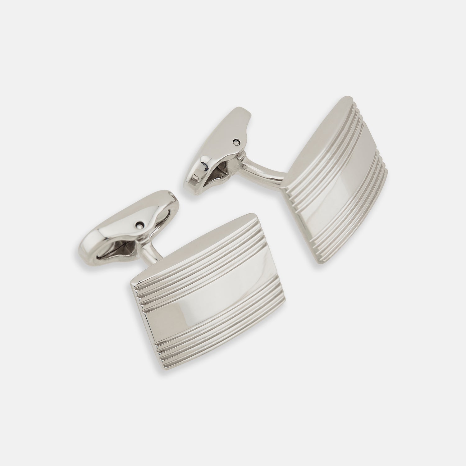 View 1 of product Turnbull & Asser Silver Striped Rectangular Cufflinks feature a subtle horizontal engraved line pattern on the front, set against a white background.