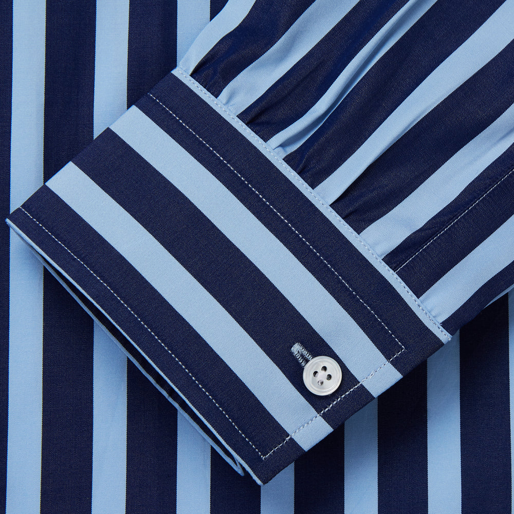 The Turnbull & Asser Navy Multi Stripe Cotton Weekend Fit Suffolk Shirt features vertical blue and navy stripes, a chest pocket, buttoned cuffs, and a classic buttoned Dorset collar.
