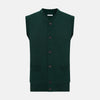View 1 of product The Forest Green Cashmere Sleeveless Cardigan by Turnbull & Asser features a V-neck, button-down front, ribbed hem and armholes, and two front pockets—an elegant menswear staple shown on a plain white background.