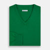 View 4 of product The Turnbull & Asser Grass Green Cashmere V-neck Jumper, with long sleeves, is displayed against a white background, highlighting its classic knitwear style.