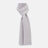 View 1 of product The Turnbull & Asser Ivory and Lilac Lozenge-Patterned Cashmere Knitted Scarf, tied loosely, reveals its refined style and geometric design against a plain white background.