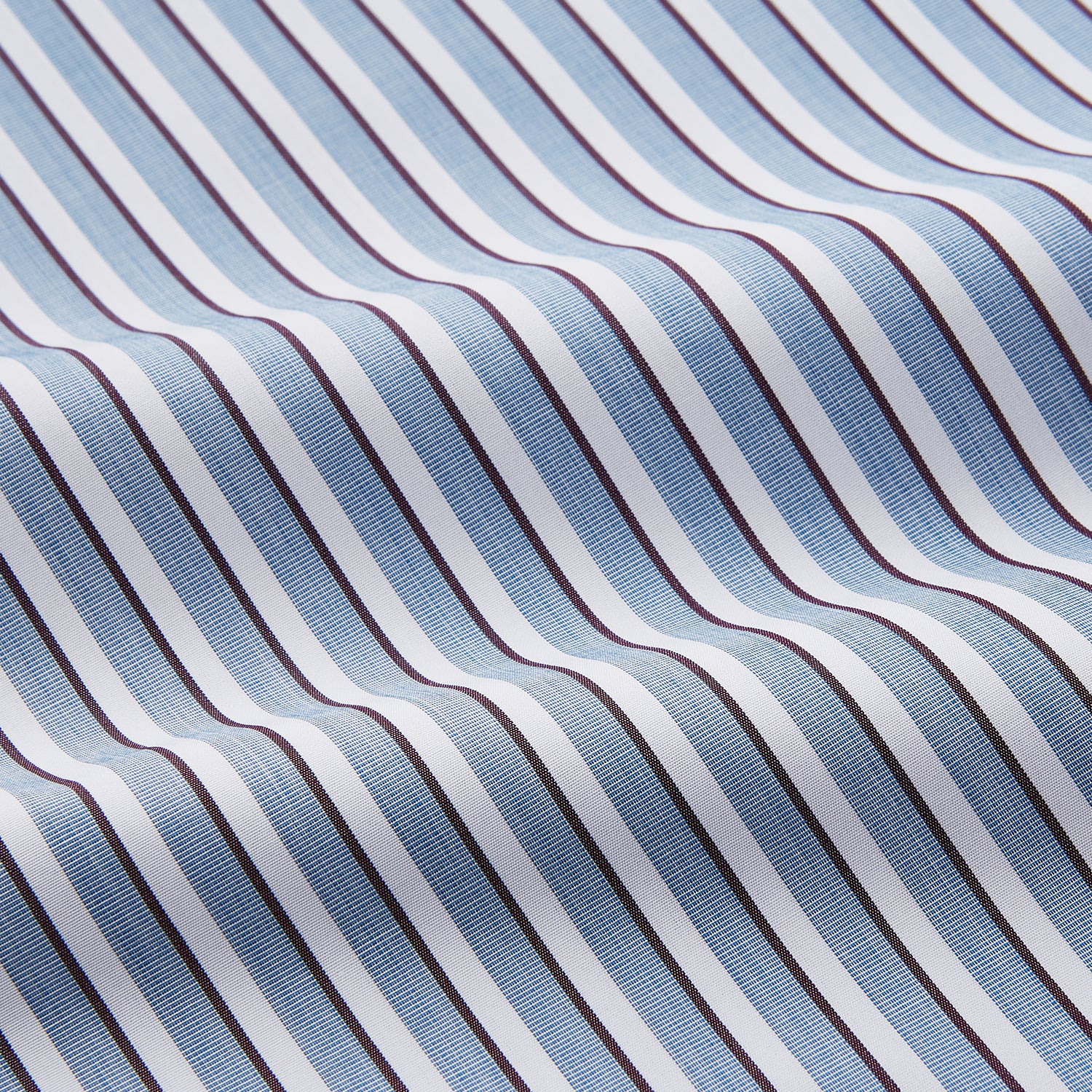 View 5 of product The Turnbull & Asser Blue and White Stripe Cotton Regular Fit Mayfair Shirt features long sleeves, a button-up front, collar, buttoned cuffs, and vertical stripes, shown on a white background.