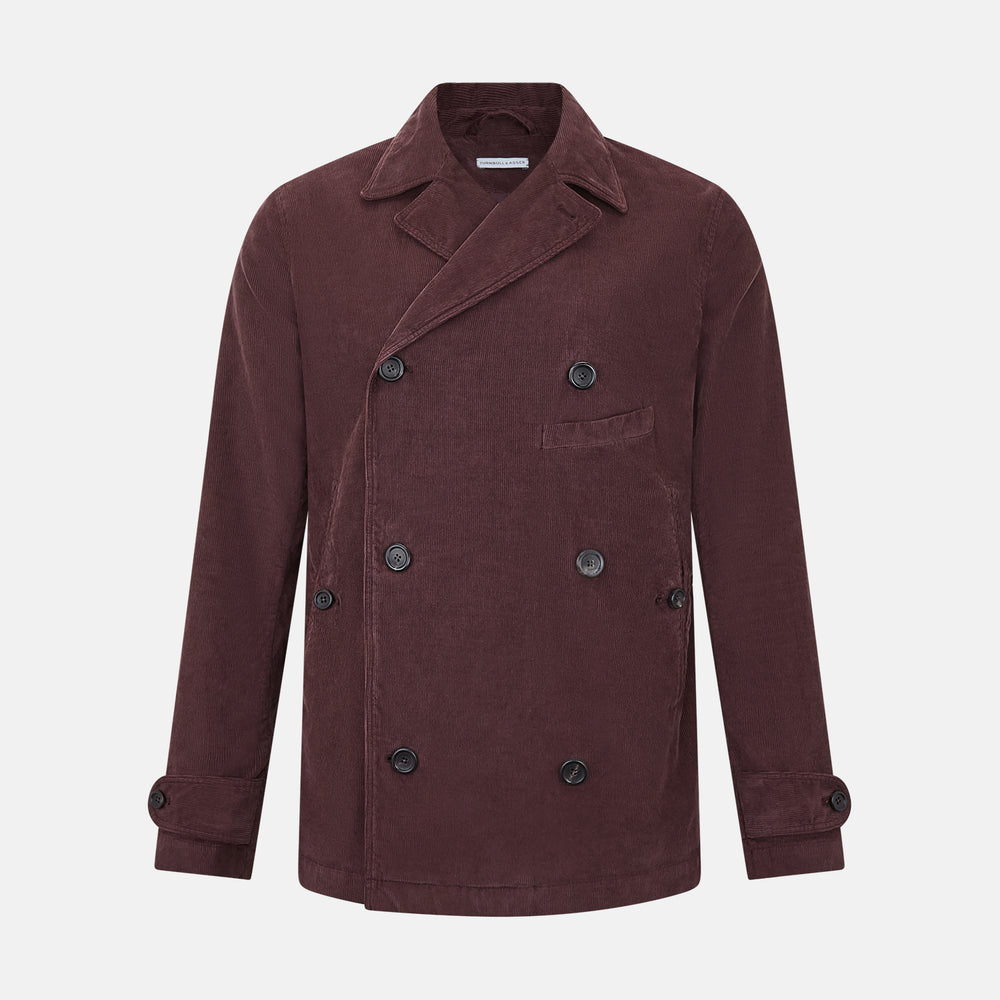 The Burgundy Kingston Corduroy Caban Jacket by Turnbull & Asser features black buttons, a notched collar, and front pockets. Crafted from premium cotton, it is shown on a plain white background.