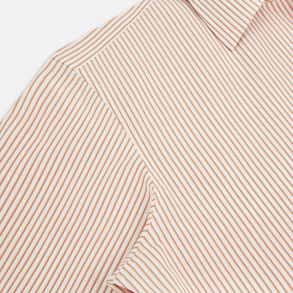 The Orange Multi Stripe Westminster Shirt by Turnbull & Asser features thin vertical orange and white stripes, a Turnbull collar, and long sleeves, elegantly displayed flat against a white background.